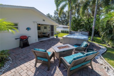 YOUR OWN PERSONAL PRIVATE PARADISE IN DELIGHTFUL DUNEDIN on The Dunedin Country Club in Florida - for sale on GolfHomes.com, golf home, golf lot