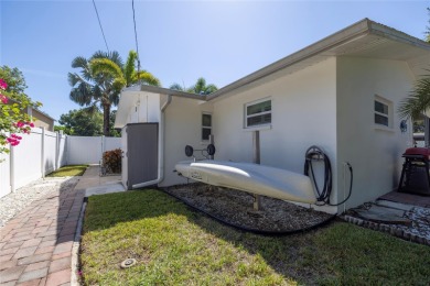 YOUR OWN PERSONAL PRIVATE PARADISE IN DELIGHTFUL DUNEDIN on The Dunedin Country Club in Florida - for sale on GolfHomes.com, golf home, golf lot