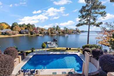 This beautiful brick lakefront home in Timberlake Estates has on Timberlake Country Club in South Carolina - for sale on GolfHomes.com, golf home, golf lot