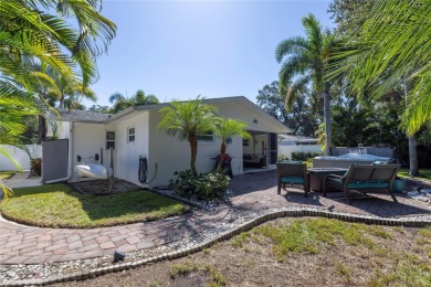 YOUR OWN PERSONAL PRIVATE PARADISE IN DELIGHTFUL DUNEDIN on The Dunedin Country Club in Florida - for sale on GolfHomes.com, golf home, golf lot
