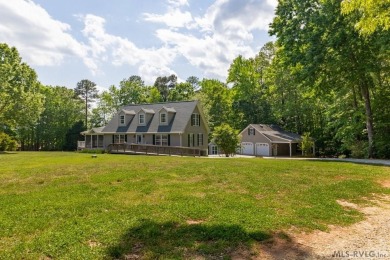 Enjoy main lake views and water-access living from this cape cod on Tanglewood Shores Golf Club in Virginia - for sale on GolfHomes.com, golf home, golf lot