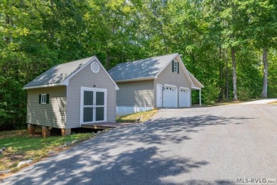Enjoy main lake views and water-access living from this cape cod on Tanglewood Shores Golf Club in Virginia - for sale on GolfHomes.com, golf home, golf lot