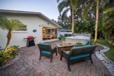 YOUR OWN PERSONAL PRIVATE PARADISE IN DELIGHTFUL DUNEDIN on The Dunedin Country Club in Florida - for sale on GolfHomes.com, golf home, golf lot
