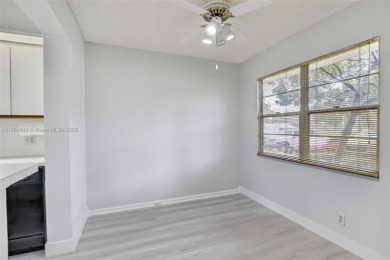 Freshly painted and newly floored ground-floor 2-bedroom on Flamingo Lakes Country Club in Florida - for sale on GolfHomes.com, golf home, golf lot
