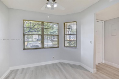 Freshly painted and newly floored ground-floor 2-bedroom on Flamingo Lakes Country Club in Florida - for sale on GolfHomes.com, golf home, golf lot