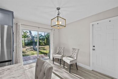 Welcome to 18470 Geranium Rd., where MODERN style meets WARM on Estero Country Club in Florida - for sale on GolfHomes.com, golf home, golf lot