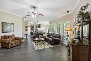 Nestled on a private, gated street overlooking the manicured on Iron Horse Golf Course in Texas - for sale on GolfHomes.com, golf home, golf lot