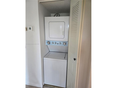 Bright and clean 1-bedroom, 1-bath unit located on the 4th floor on Flamingo Lakes Country Club in Florida - for sale on GolfHomes.com, golf home, golf lot