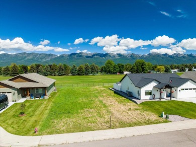 Remarks: Mountain views galore! This 9,235 Sq. Ft. building lot on Polson Bay Golf Course - Championship Course in Montana - for sale on GolfHomes.com, golf home, golf lot