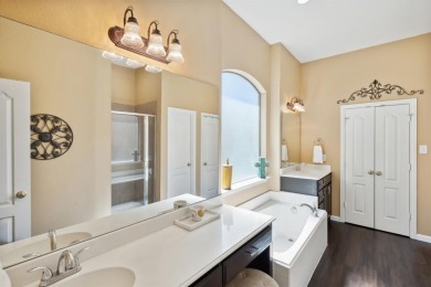 Nestled on a private, gated street overlooking the manicured on Iron Horse Golf Course in Texas - for sale on GolfHomes.com, golf home, golf lot