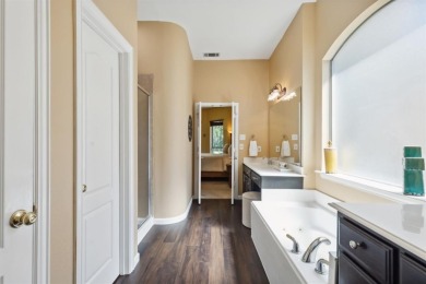 Nestled on a private, gated street overlooking the manicured on Iron Horse Golf Course in Texas - for sale on GolfHomes.com, golf home, golf lot