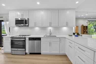 Welcome to this rarely available first-floor corner VILLA at on Hunters Run Golf and Country Club in Florida - for sale on GolfHomes.com, golf home, golf lot