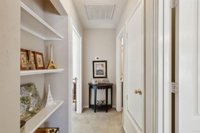 Nestled on a private, gated street overlooking the manicured on Iron Horse Golf Course in Texas - for sale on GolfHomes.com, golf home, golf lot