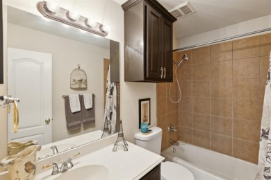 Nestled on a private, gated street overlooking the manicured on Iron Horse Golf Course in Texas - for sale on GolfHomes.com, golf home, golf lot
