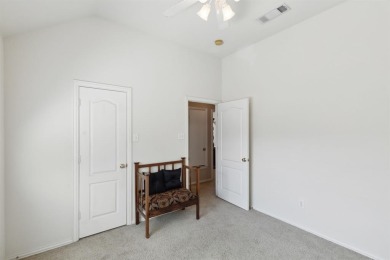 Nestled on a private, gated street overlooking the manicured on Iron Horse Golf Course in Texas - for sale on GolfHomes.com, golf home, golf lot