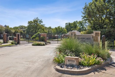 Nestled on a private, gated street overlooking the manicured on Iron Horse Golf Course in Texas - for sale on GolfHomes.com, golf home, golf lot