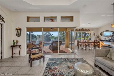Enjoy the endless, breathtaking lake views on the lanai of this on Burnt Store Golf Club in Florida - for sale on GolfHomes.com, golf home, golf lot