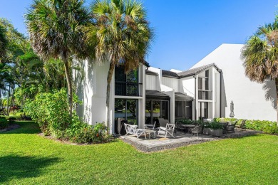 WALK TO EVERYTHING Renovated inside and out, new roofs, fencing on Boca West Golf and Country Club in Florida - for sale on GolfHomes.com, golf home, golf lot
