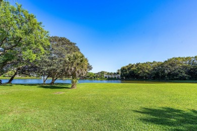 WALK TO EVERYTHING Renovated inside and out, new roofs, fencing on Boca West Golf and Country Club in Florida - for sale on GolfHomes.com, golf home, golf lot