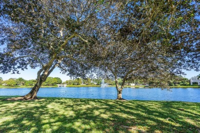 WALK TO EVERYTHING Renovated inside and out, new roofs, fencing on Boca West Golf and Country Club in Florida - for sale on GolfHomes.com, golf home, golf lot