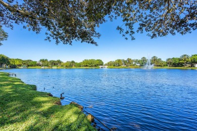 WALK TO EVERYTHING Renovated inside and out, new roofs, fencing on Boca West Golf and Country Club in Florida - for sale on GolfHomes.com, golf home, golf lot
