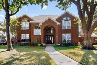 Stunning Traditional-style home featuring a symmetrical brick on The Courses at Watters Creek in Texas - for sale on GolfHomes.com, golf home, golf lot