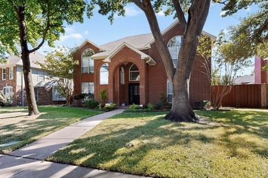 Stunning Traditional-style home featuring a symmetrical brick on The Courses at Watters Creek in Texas - for sale on GolfHomes.com, golf home, golf lot