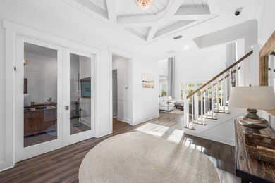 Experience the pinnacle of coastal luxury in this pristine on Origins Golf Club in Florida - for sale on GolfHomes.com, golf home, golf lot