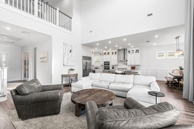 Experience the pinnacle of coastal luxury in this pristine on Origins Golf Club in Florida - for sale on GolfHomes.com, golf home, golf lot