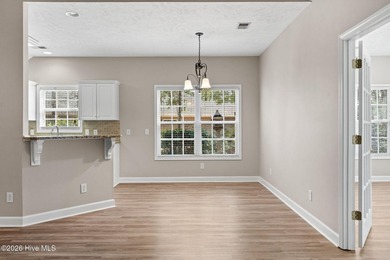 Experience the ease of Coastal Living in the scenic riverfront on Carolina Shores Golf Course in North Carolina - for sale on GolfHomes.com, golf home, golf lot