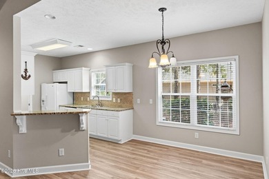 Experience the ease of Coastal Living in the scenic riverfront on Carolina Shores Golf Course in North Carolina - for sale on GolfHomes.com, golf home, golf lot