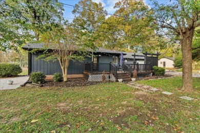 This beautiful 3-bedroom, 2-bathroom home is located just steps on Dalton Golf and Country Club in Georgia - for sale on GolfHomes.com, golf home, golf lot