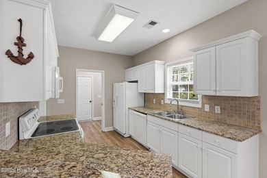 Experience the ease of Coastal Living in the scenic riverfront on Carolina Shores Golf Course in North Carolina - for sale on GolfHomes.com, golf home, golf lot