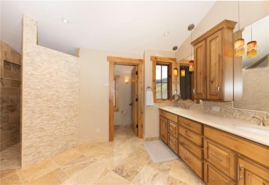 Meticulous craftsmanship and thoughtful design define this on Raven Golf Club At Three Peaks in Colorado - for sale on GolfHomes.com, golf home, golf lot