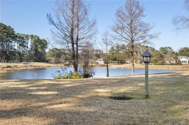 A beautiful new paver driveway and walkway lead to the on Hidden Cypress Golf Club in South Carolina - for sale on GolfHomes.com, golf home, golf lot