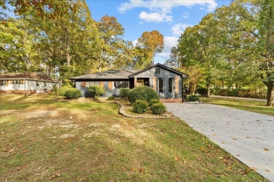 This beautiful 3-bedroom, 2-bathroom home is located just steps on Dalton Golf and Country Club in Georgia - for sale on GolfHomes.com, golf home, golf lot