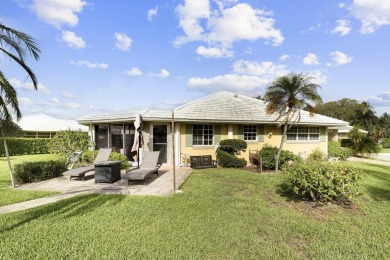 This charming single-family residence boasting 2 bedrooms and 2 on Atlantis Golf Club in Florida - for sale on GolfHomes.com, golf home, golf lot