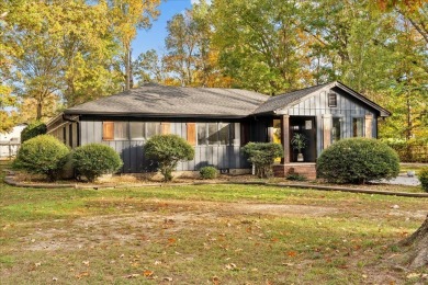 This beautiful 3-bedroom, 2-bathroom home is located just steps on Dalton Golf and Country Club in Georgia - for sale on GolfHomes.com, golf home, golf lot