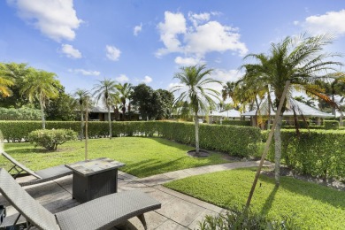 This charming single-family residence boasting 2 bedrooms and 2 on Atlantis Golf Club in Florida - for sale on GolfHomes.com, golf home, golf lot
