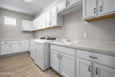 Step into the elegance of Ocala Preserve living with this former on Trilogy at Ocala Preserve in Florida - for sale on GolfHomes.com, golf home, golf lot