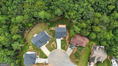 Welcome Home to 29 Creekview Drive! This stunning Alexander on The Plantation Golf Club in Georgia - for sale on GolfHomes.com, golf home, golf lot