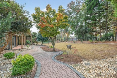 Welcome home to 1090 River Valley Drive, a beautifully updated on Trophy Club of Apalachee in Georgia - for sale on GolfHomes.com, golf home, golf lot