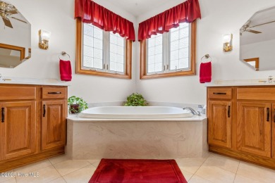This custom 4-bedroom, 2.5-bath brick home is a true gem on Brunswick Plantation and Golf Resorts in North Carolina - for sale on GolfHomes.com, golf home, golf lot