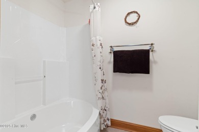 This custom 4-bedroom, 2.5-bath brick home is a true gem on Brunswick Plantation and Golf Resorts in North Carolina - for sale on GolfHomes.com, golf home, golf lot