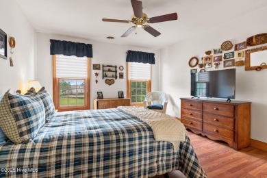 This custom 4-bedroom, 2.5-bath brick home is a true gem on Brunswick Plantation and Golf Resorts in North Carolina - for sale on GolfHomes.com, golf home, golf lot