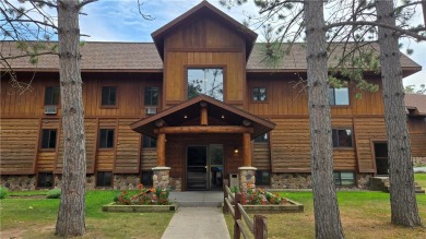 Enjoy all the perks of going to the cabin--without any of the on Lakewoods Forest Ridges Golf Club in Wisconsin - for sale on GolfHomes.com, golf home, golf lot