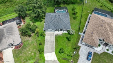 Nestled on an oversized corner lot, and features NEW ROOF 2022 on Bobcat Trail Golf Club in Florida - for sale on GolfHomes.com, golf home, golf lot