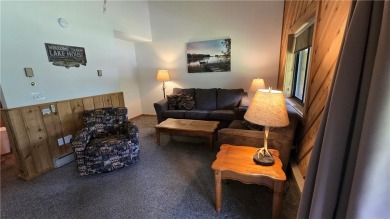 Enjoy all the perks of going to the cabin--without any of the on Lakewoods Forest Ridges Golf Club in Wisconsin - for sale on GolfHomes.com, golf home, golf lot
