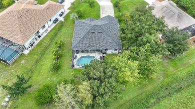 Nestled on an oversized corner lot, and features NEW ROOF 2022 on Bobcat Trail Golf Club in Florida - for sale on GolfHomes.com, golf home, golf lot