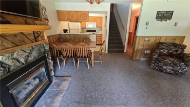 Enjoy all the perks of going to the cabin--without any of the on Lakewoods Forest Ridges Golf Club in Wisconsin - for sale on GolfHomes.com, golf home, golf lot